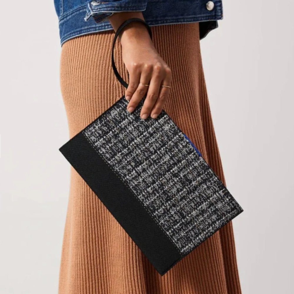 Rothy’s The Wristlet in midnight tweed
